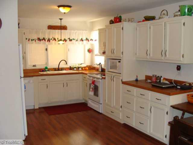 7300 Rader Climax, NC 27233 - Photo 2 of 16 Kitchen. Really nice kitchen with lots of cabinet and counter top space! Beautiful real hardwood counter tops! One really nice kitchen!