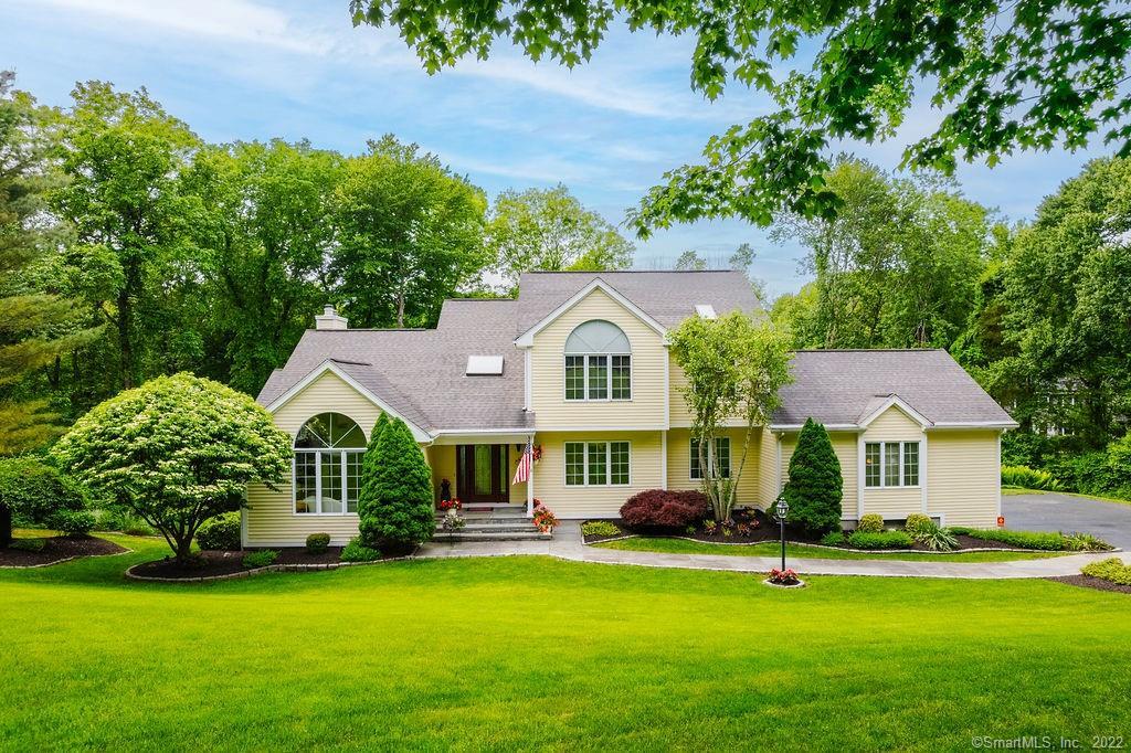Welcome to this stunning 4-5 bedroom/4 full bath colonial