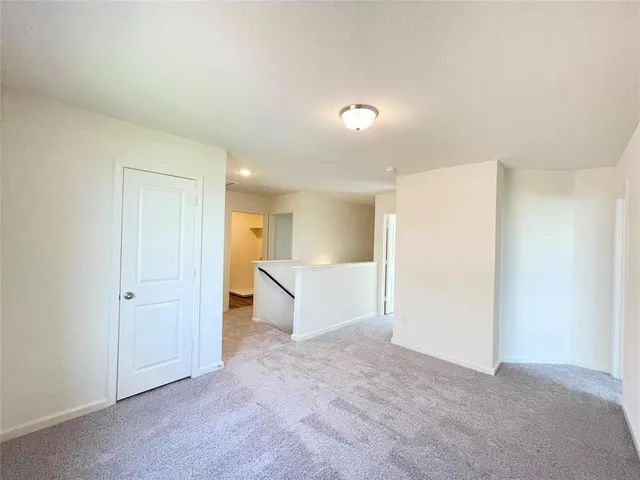 a view of kitchen with microwave and stove