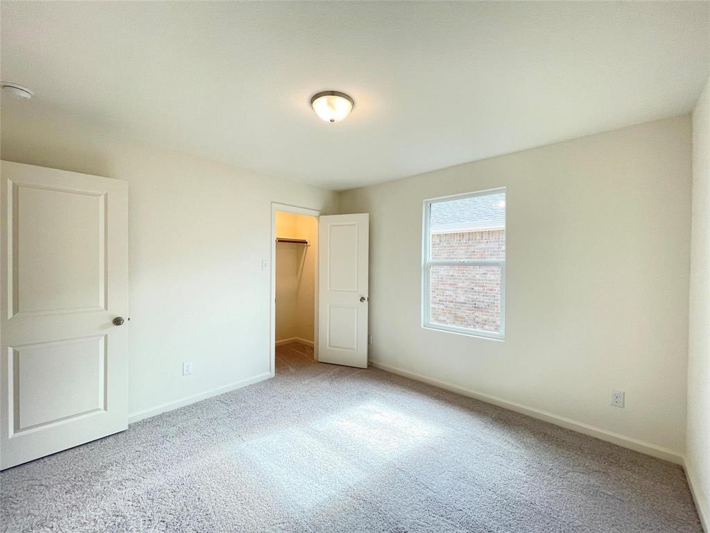 1702 Chapel Hl Road Princeton, TX 75407 - Photo 15 of 24 an empty room with windows