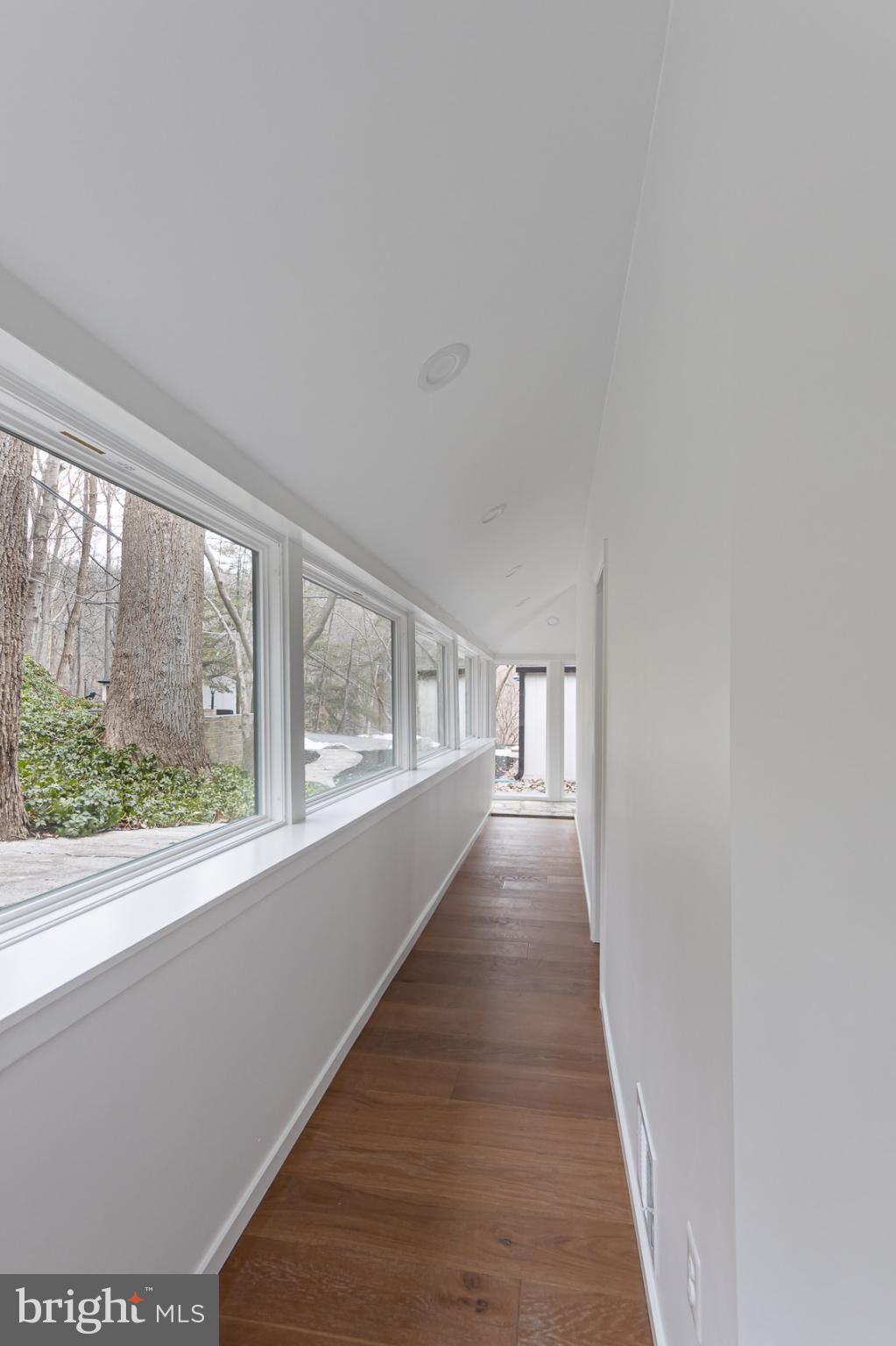 903 Ivy Hill Road Cockeysville, MD 21030 - Photo 38 of 95 Bright, airy hallway with nature views.