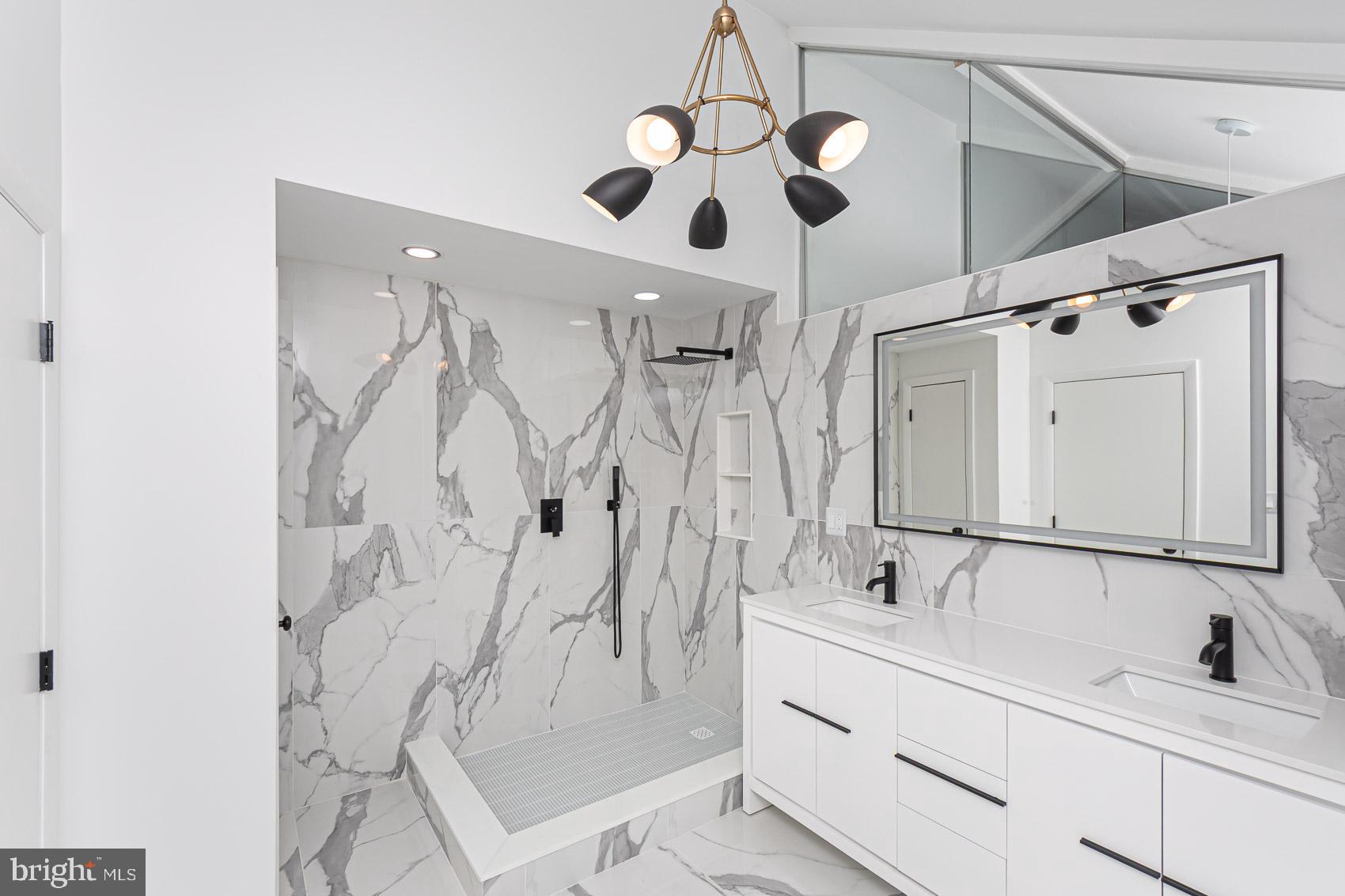 903 Ivy Hill Road Cockeysville, MD 21030 - Photo 43 of 95 Sleek modern bathroom with elegant marble.