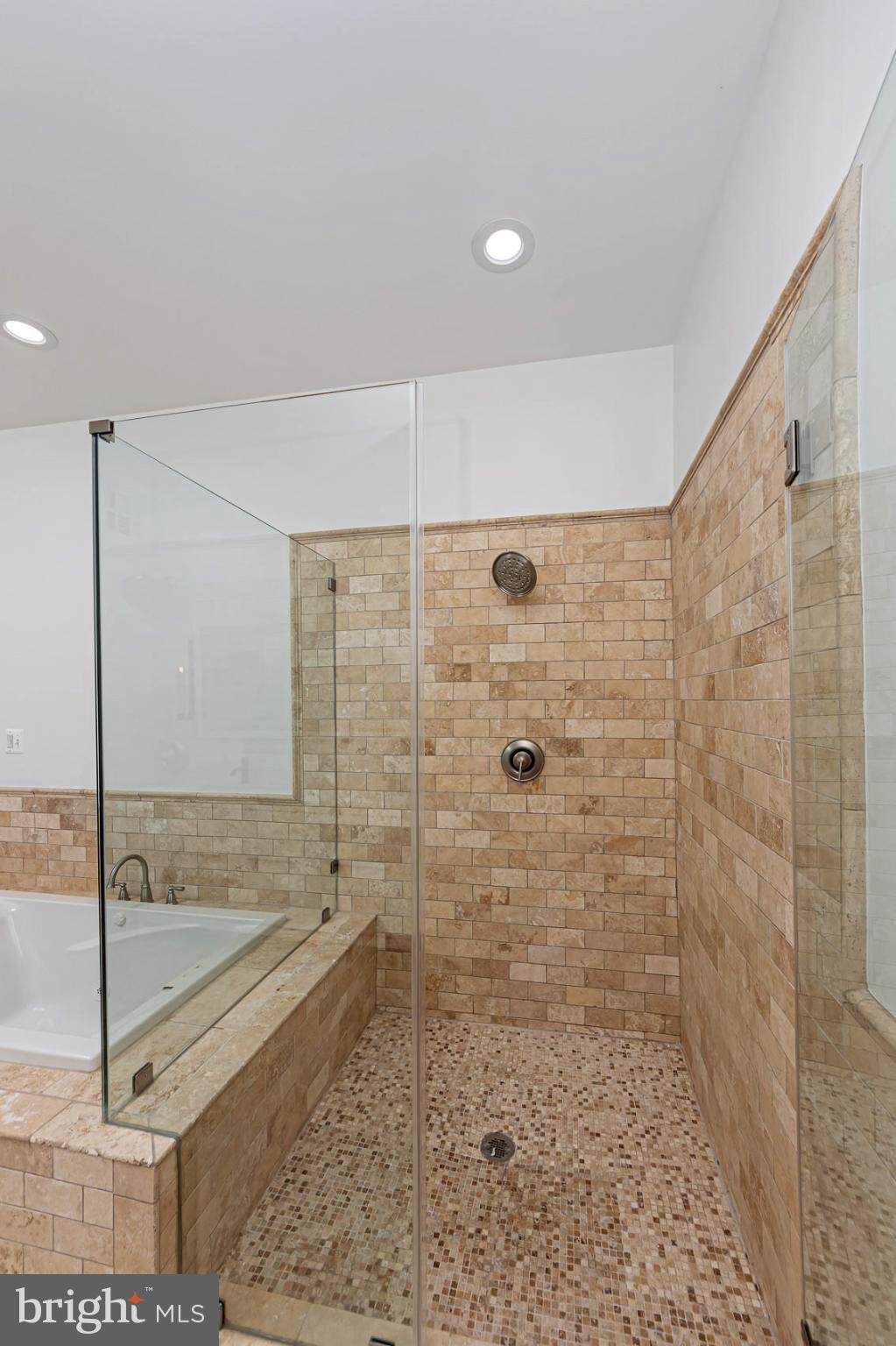 903 Ivy Hill Road Cockeysville, MD 21030 - Photo 54 of 95 Elegant shower with natural stone accents.