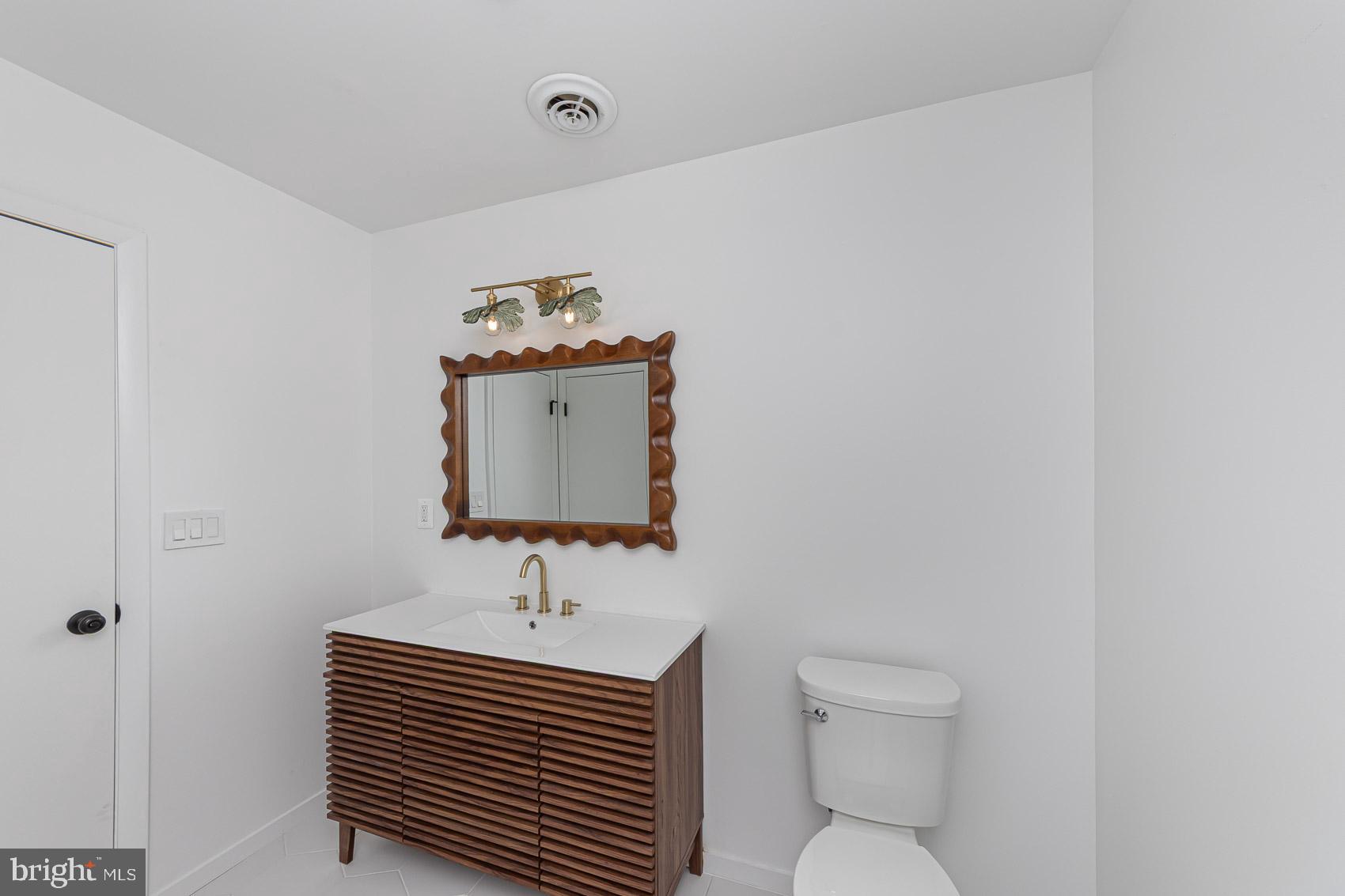 903 Ivy Hill Road Cockeysville, MD 21030 - Photo 63 of 95 Chic bathroom with modern elegance.