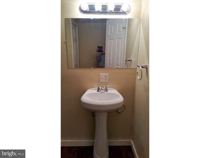 228 Cambridge Road Coatesville, PA 19320 - Photo 12 of 21 Main level bath next to bedrooms