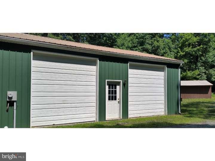 228 Cambridge Road Coatesville, PA 19320 - Photo 19 of 21 Huge garage with loads of space and rest room.
