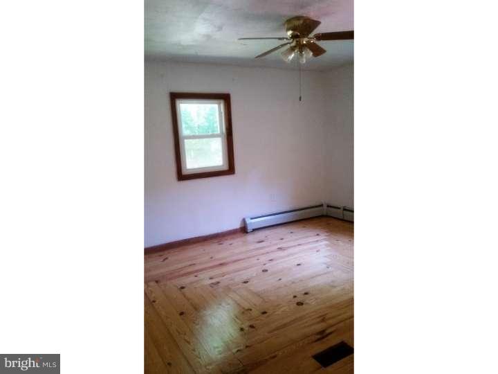 228 Cambridge Road Coatesville, PA 19320 - Photo 10 of 21 Bedroom with ceiling fan.