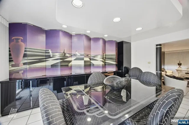 a dinning room with furniture