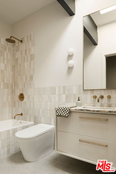 300 Anita Drive Pasadena, CA 91105 - Photo 11 of 26 a bathroom with a granite countertop sink and a mirror