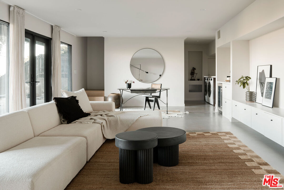 300 Anita Drive Pasadena, CA 91105 - Photo 20 of 26 a living room with fireplace furniture and a large window