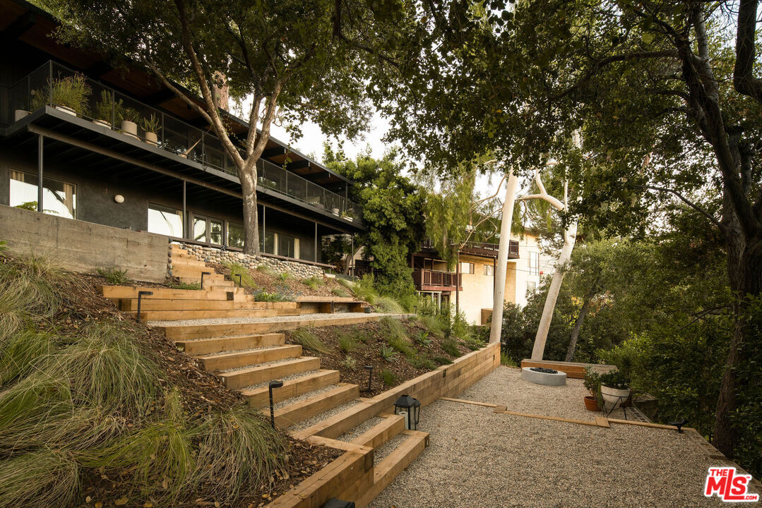 300 Anita Drive Pasadena, CA 91105 - Photo 24 of 26 a view of a house with a tree beside it
