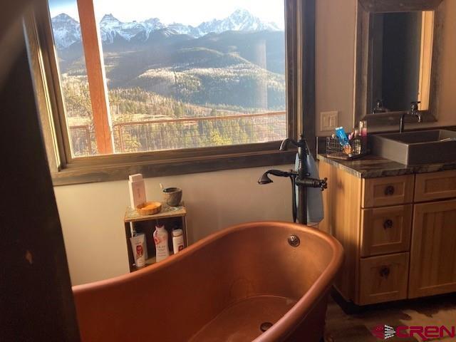 8935 County Road 5 Ridgway, CO 81432 - Photo 21 of 35 a view of a living room with furniture and a window