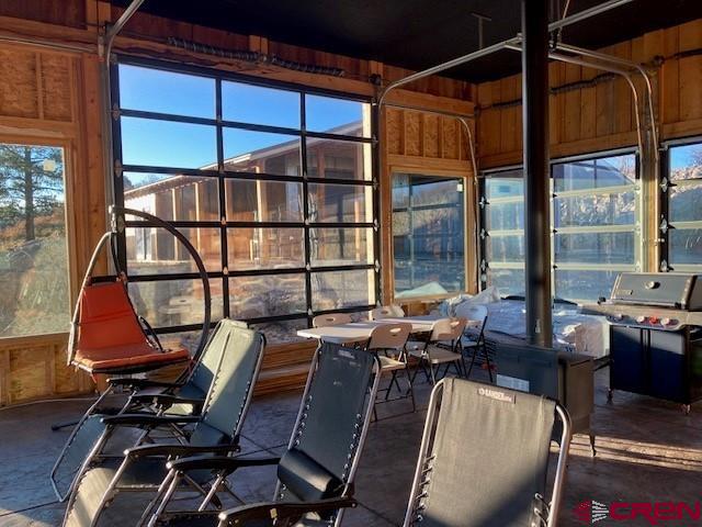 8935 County Road 5 Ridgway, CO 81432 - Photo 24 of 35 a view of a workspace with furniture and a window