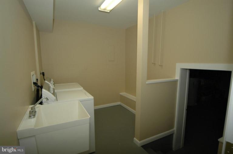 40264 Braddock Road Aldie, VA 20105 - Photo 15 of 19 Utility sink,washer/dryer, plus plenty of storage