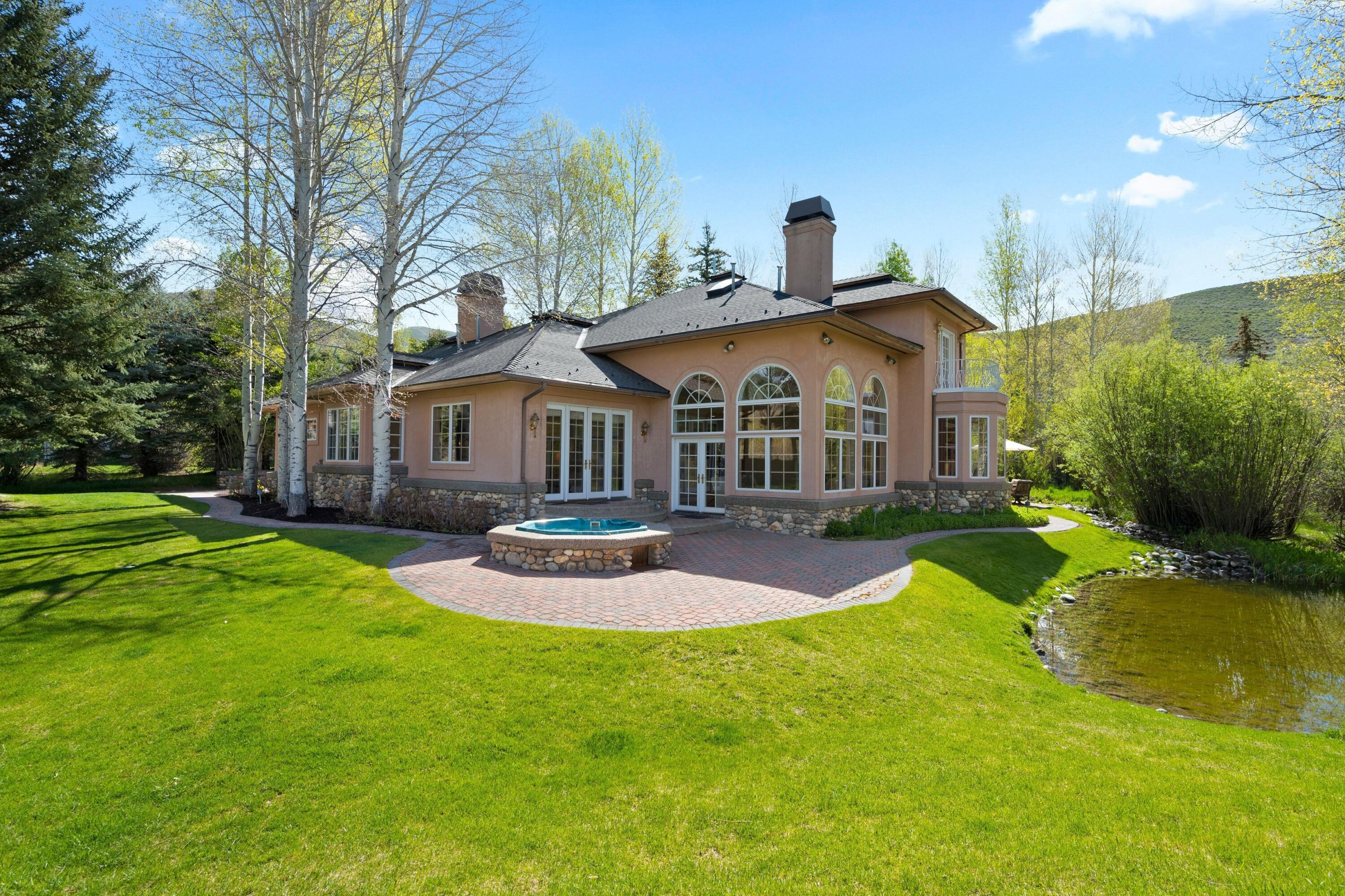 702 Morning Star Road Sun Valley, ID 83353 - Photo 4 of 37 Back of home with hot tub
