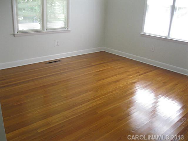 321 Fieldstone Road Mooresville, NC 28115 - Photo 8 of 10 a view of empty room with wooden floor and fan