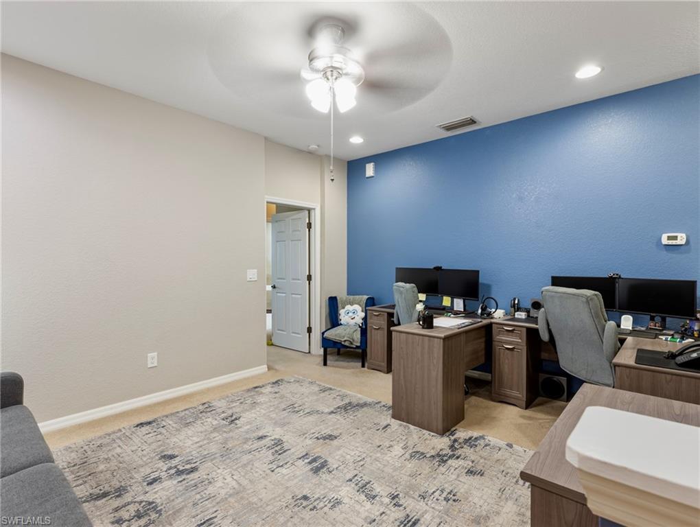 20026 Larino Loop Estero, FL 33928 - Photo 25 of 48 a workspace with furniture