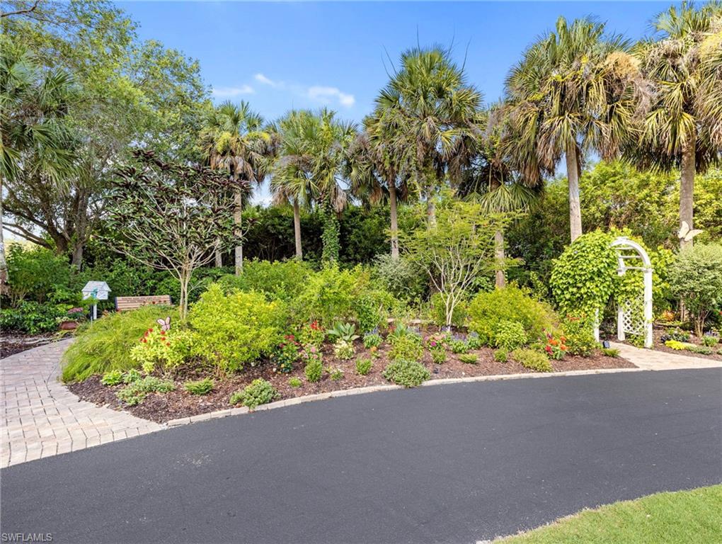 20026 Larino Loop Estero, FL 33928 - Photo 45 of 48 a view of a garden