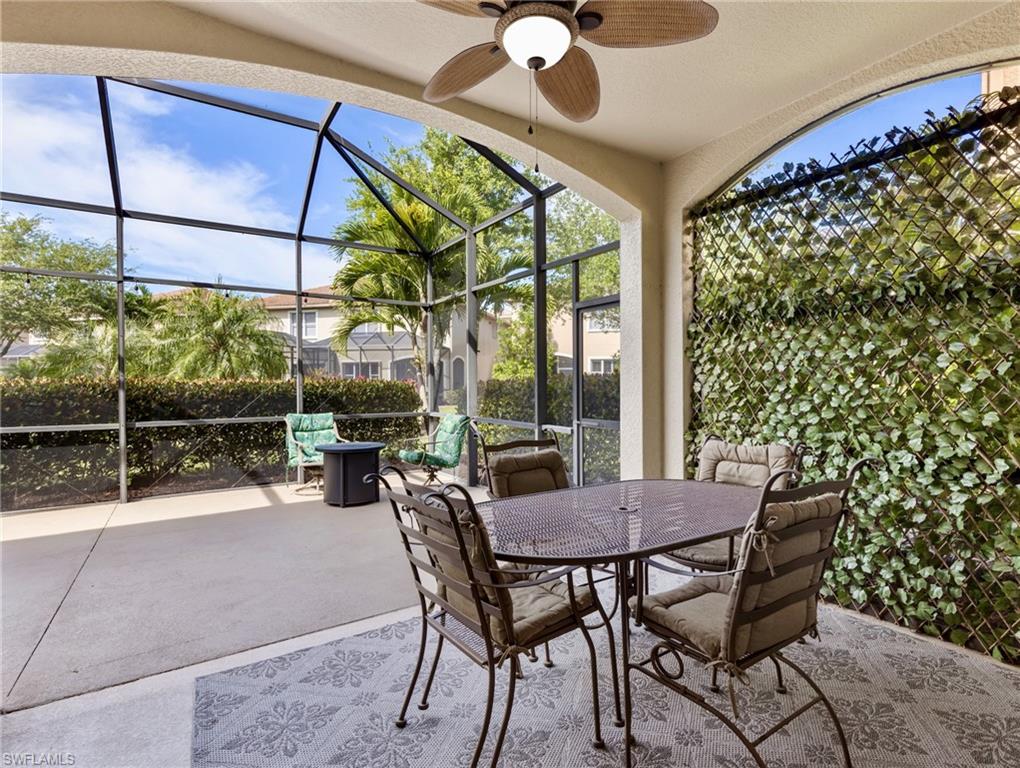 20026 Larino Loop Estero, FL 33928 - Photo 8 of 48 a view of a dining room with furniture window and outside view