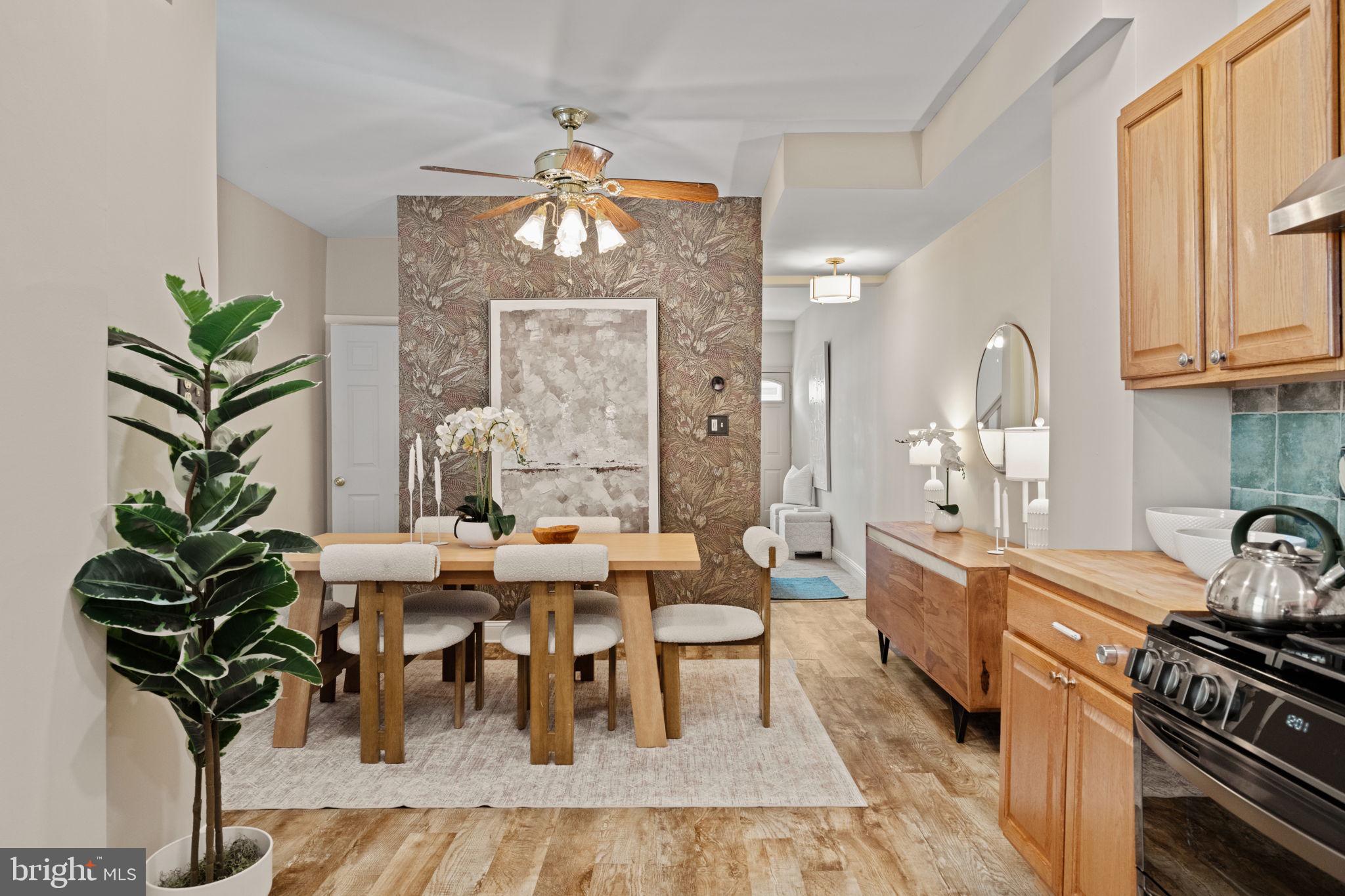 4092 Pechin Street Philadelphia, PA 19128 - Photo 6 of 28 a view of a dining room with furniture and a chandelier