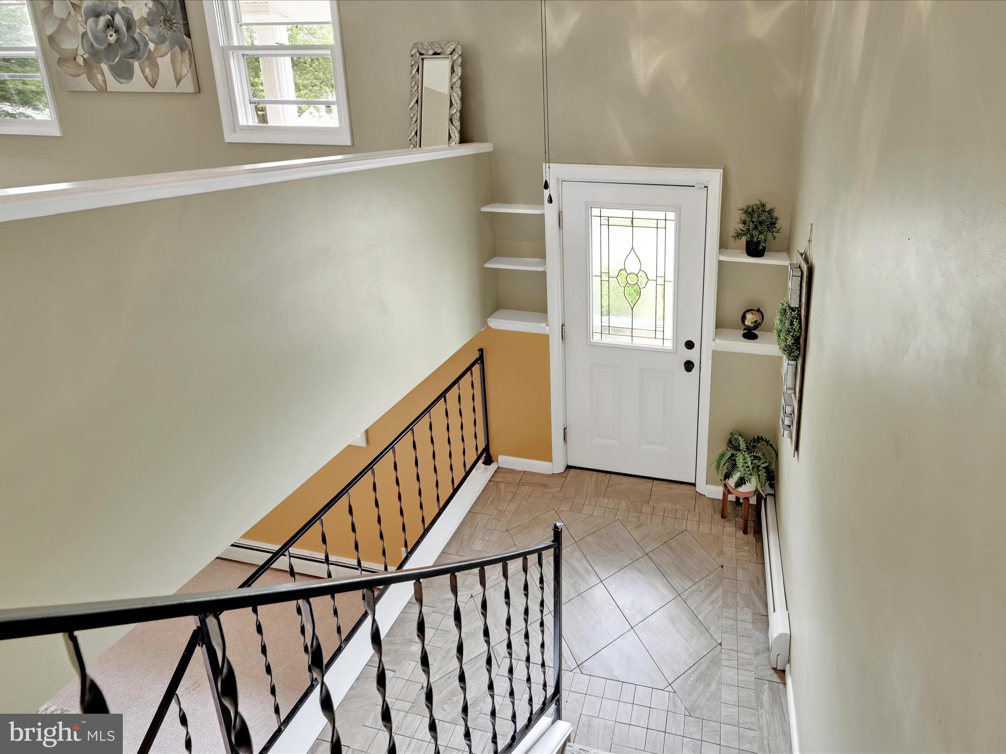 315 Morrison Road Reading, PA 19601 - Photo 4 of 30 a view of entryway with wooden floor and stairs
