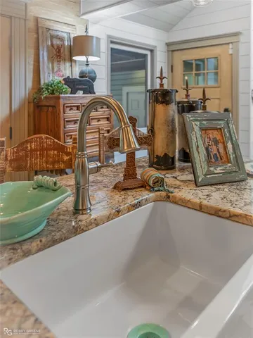 a view of a swimming pool with outdoor seating