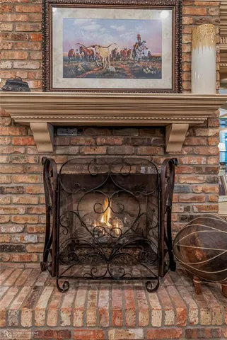a stove top oven sitting inside of a kitchen