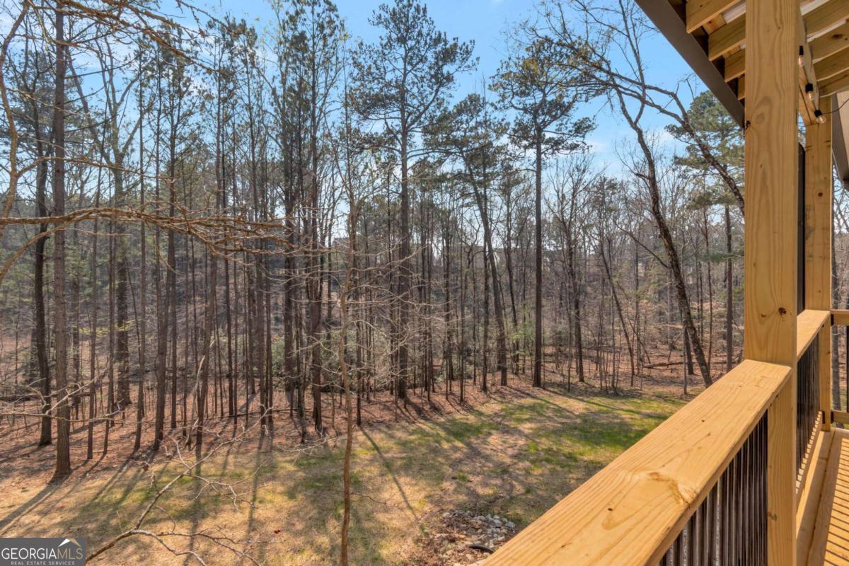 629 Butterworth Road Canton, GA 30114 - Photo 16 of 27 a view of outdoor space with wooden deck