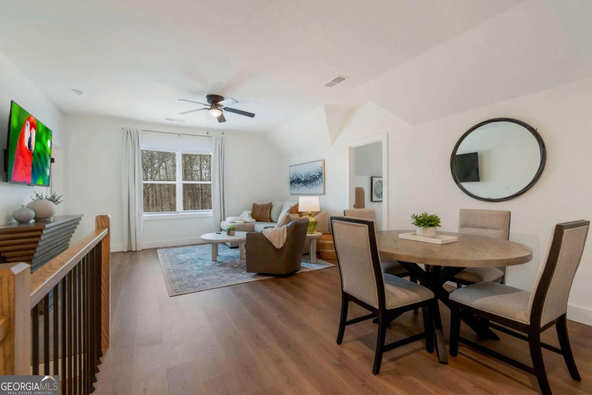 629 Butterworth Road Canton, GA 30114 - Photo 17 of 27 a living room with fireplace furniture and a window