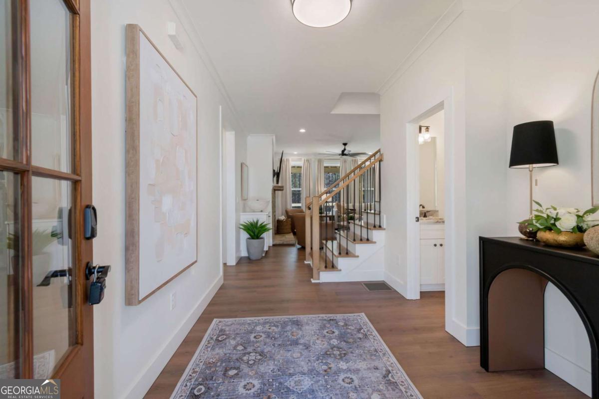 629 Butterworth Road Canton, GA 30114 - Photo 9 of 27 a living room with furniture and a rug