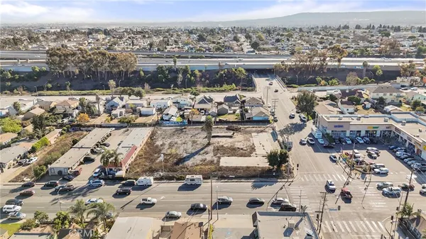 an aerial view of a city with lots of residential buildings