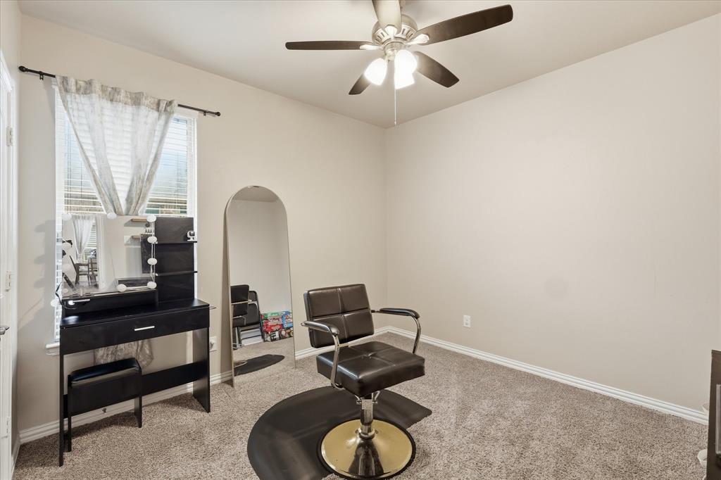 215 Equestrian Road Hickory Creek, TX 75065 - Photo 20 of 36 a workspace with furniture and chandelier