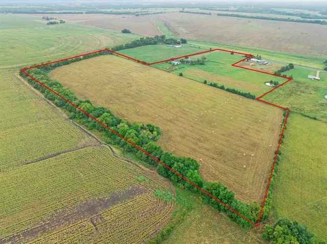 a view of a swimming pool and an outdoor space