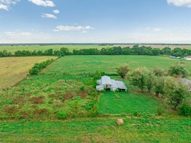 a view of a golf course with a lake