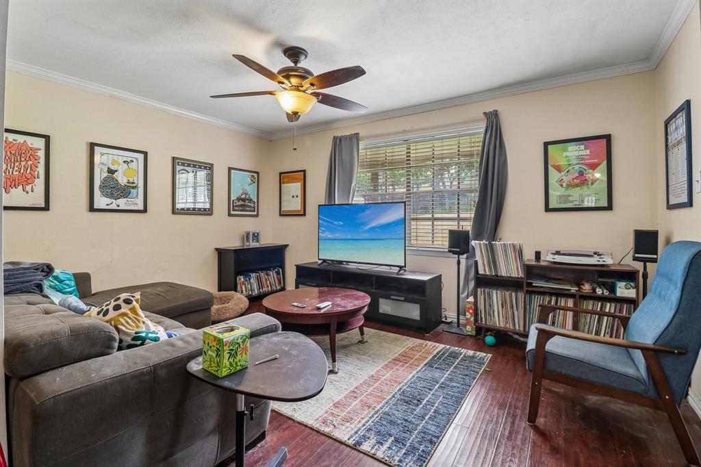 820 North Bowen Road Arlington, TX 76012 - Photo 13 of 40 a living room with furniture and wooden floor