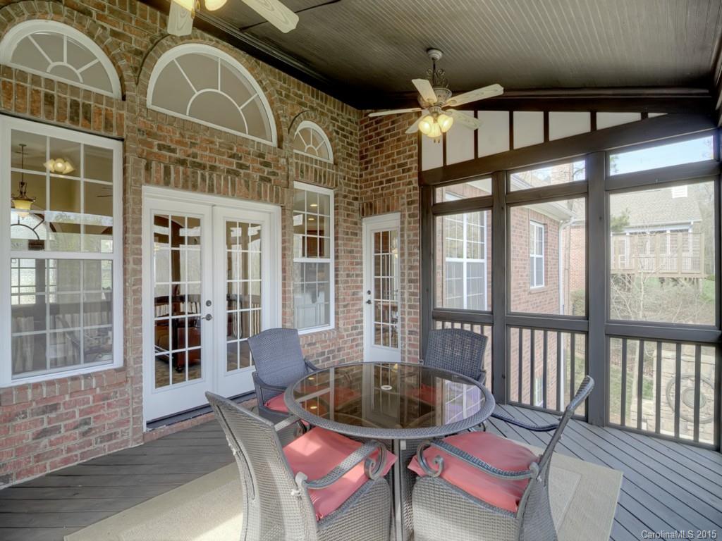 6729 Fox Ridge Circle Davidson, NC 28036 - Photo 19 of 24 a view of a building with a porch