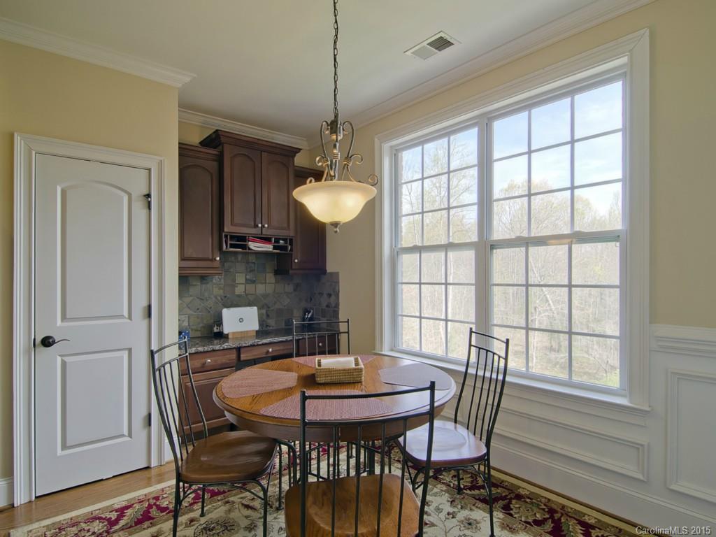 6729 Fox Ridge Circle Davidson, NC 28036 - Photo 6 of 24 a view of a dining room with furniture and window