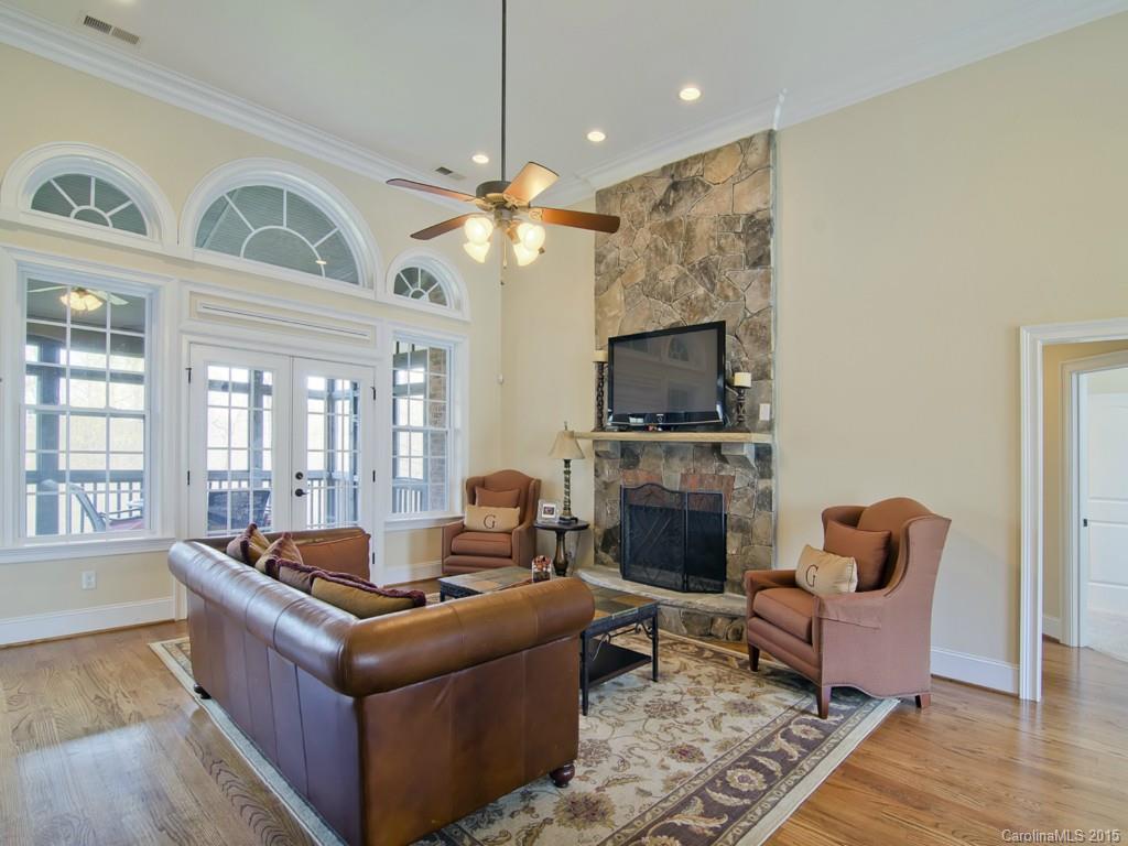 6729 Fox Ridge Circle Davidson, NC 28036 - Photo 9 of 24 a living room with furniture fireplace and flat screen tv