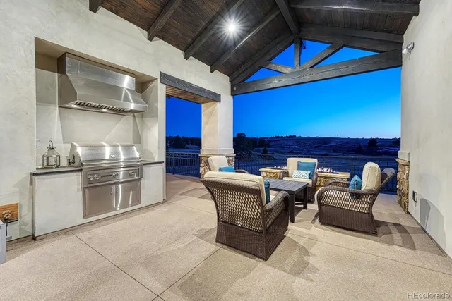 a kitchen with stainless steel appliances kitchen island granite countertop a sink and cabinets
