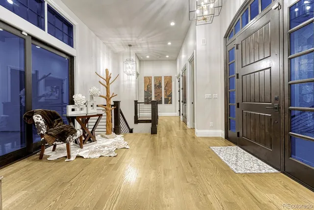 a view of a entryway with furniture and floor to ceiling window
