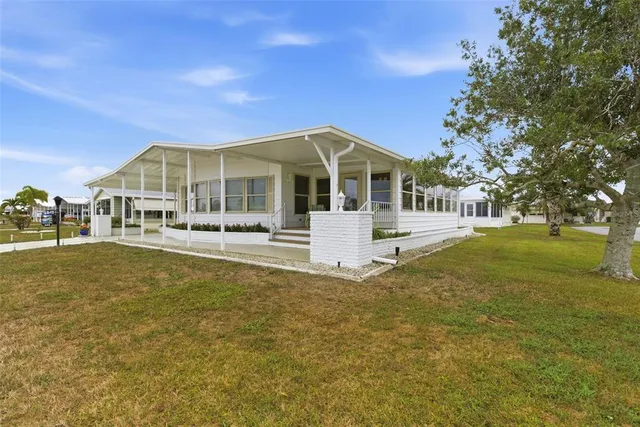 a view of a house with a swimming pool