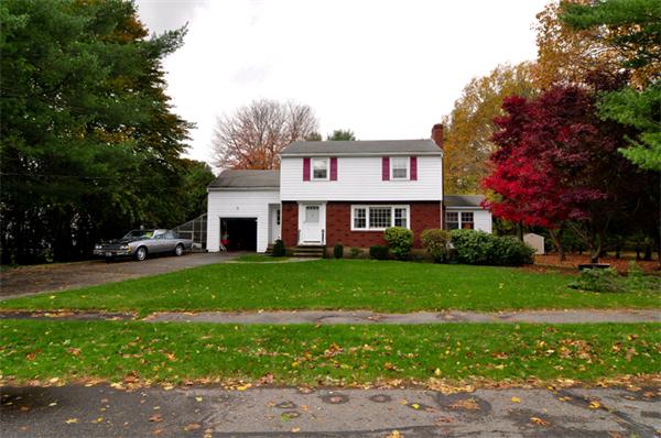 6 Brent Road Lexington, MA 02420 - Photo 1 of 9 a view of a house with a yard