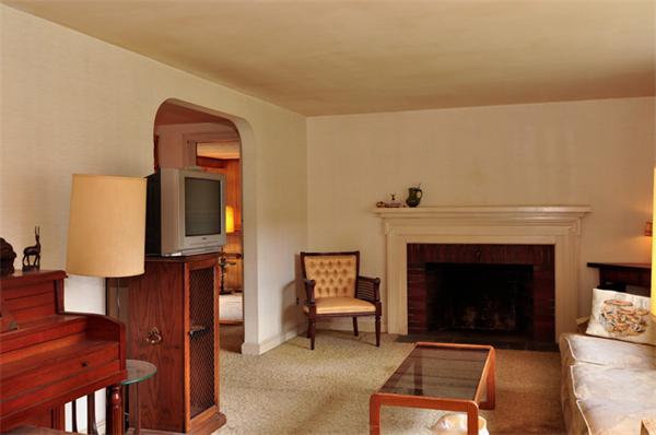 6 Brent Road Lexington, MA 02420 - Photo 4 of 9 a living room with furniture and a fireplace