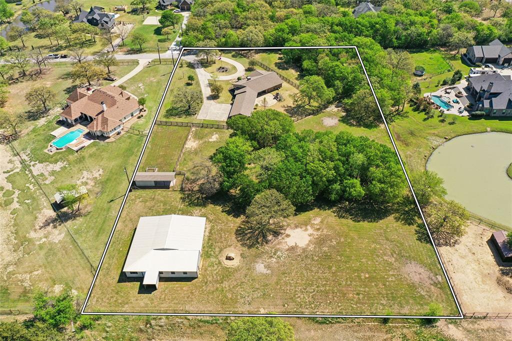 1006 Cochran Road Argyle, TX 76226 - Photo 2 of 40 a view of a swimming pool