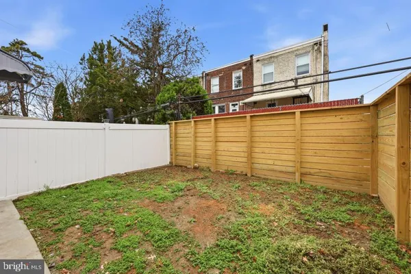 a view of a back yard of the house
