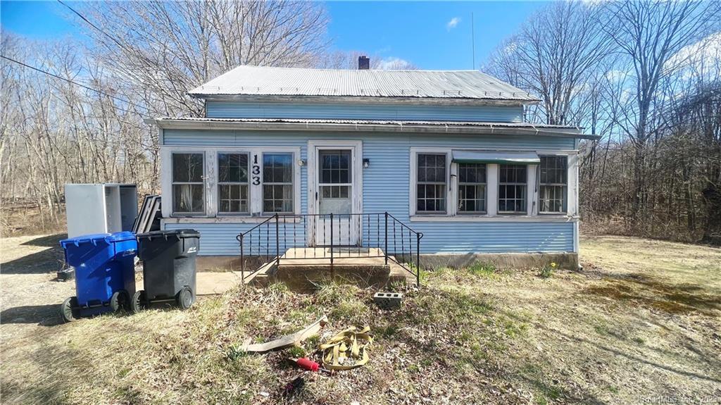 133 Armstrong Road Coventry, CT 06238 - Photo 1 of 1 a front view of a house with garden