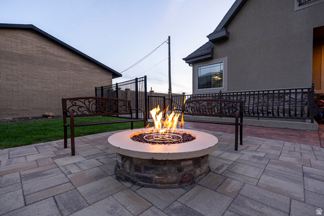 687 South 2080th Street East Springville, UT 84663 - Photo 132 of 149 Outdoor fire pit featuring a stone base and a precast concrete cap