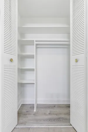 a view of a room with rack on the wall