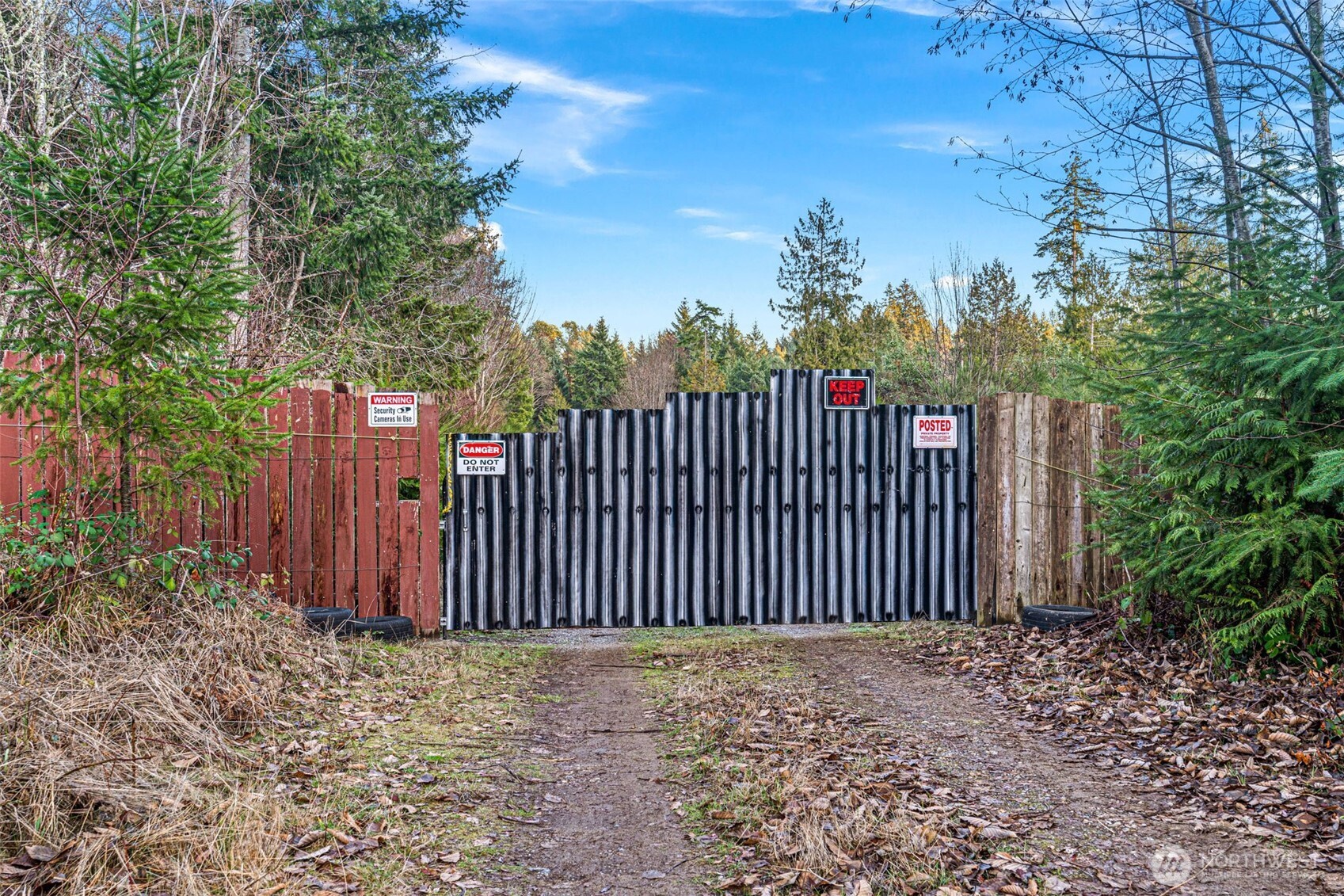 45 Whiteman Road Southwest Lakebay, WA 98351 - Photo 5 of 15 a view of a black gate