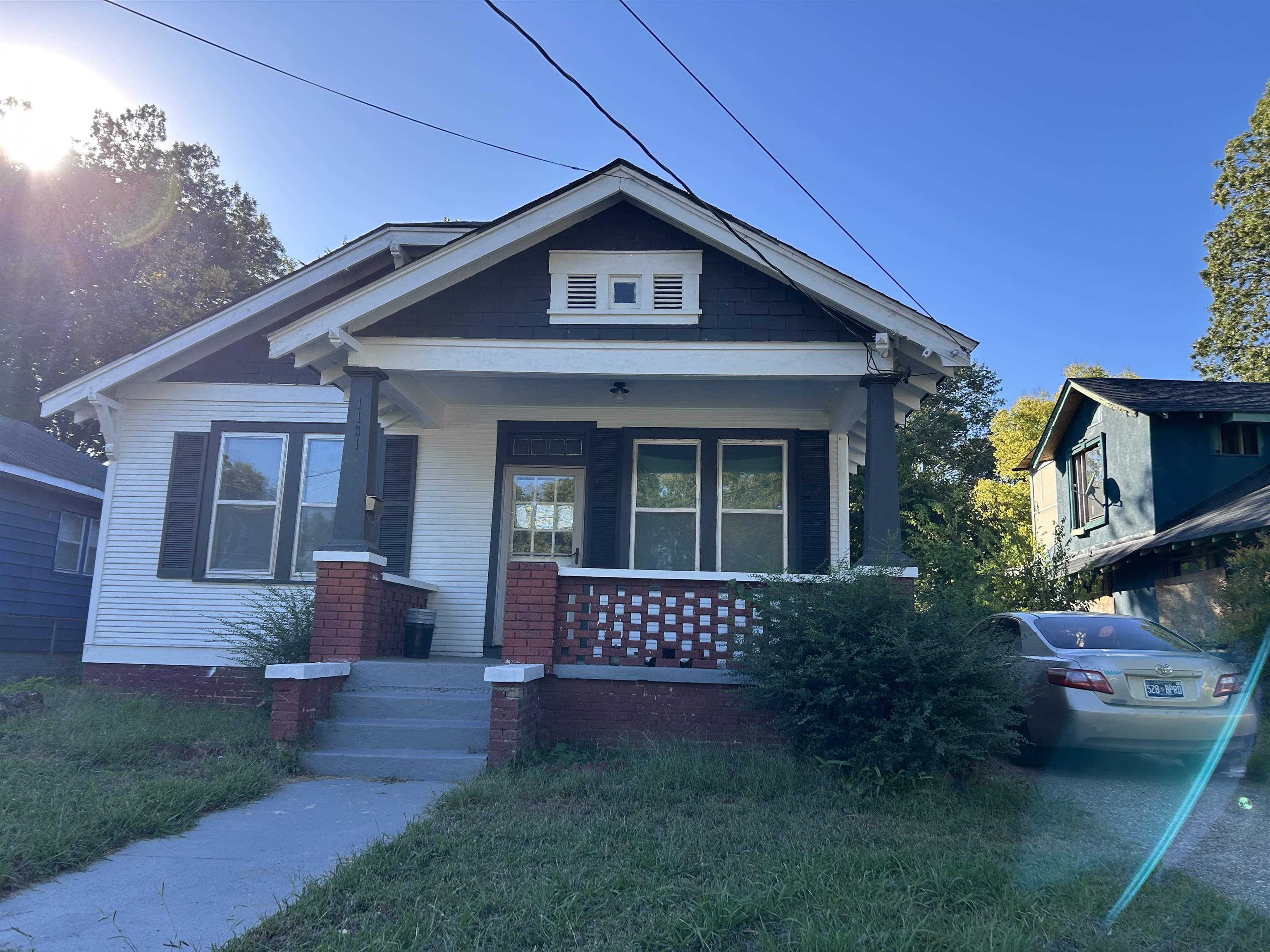1131 Rozelle Street Memphis, TN 38106 - Photo 18 of 19 a front view of a house with a yard